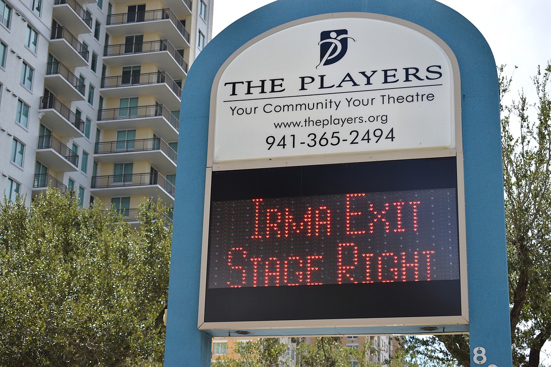 The sign outside The Players Centre for Performing Arts still joked about Hurricane Irma on Monday afternoon. Photo by Niki Kottmann