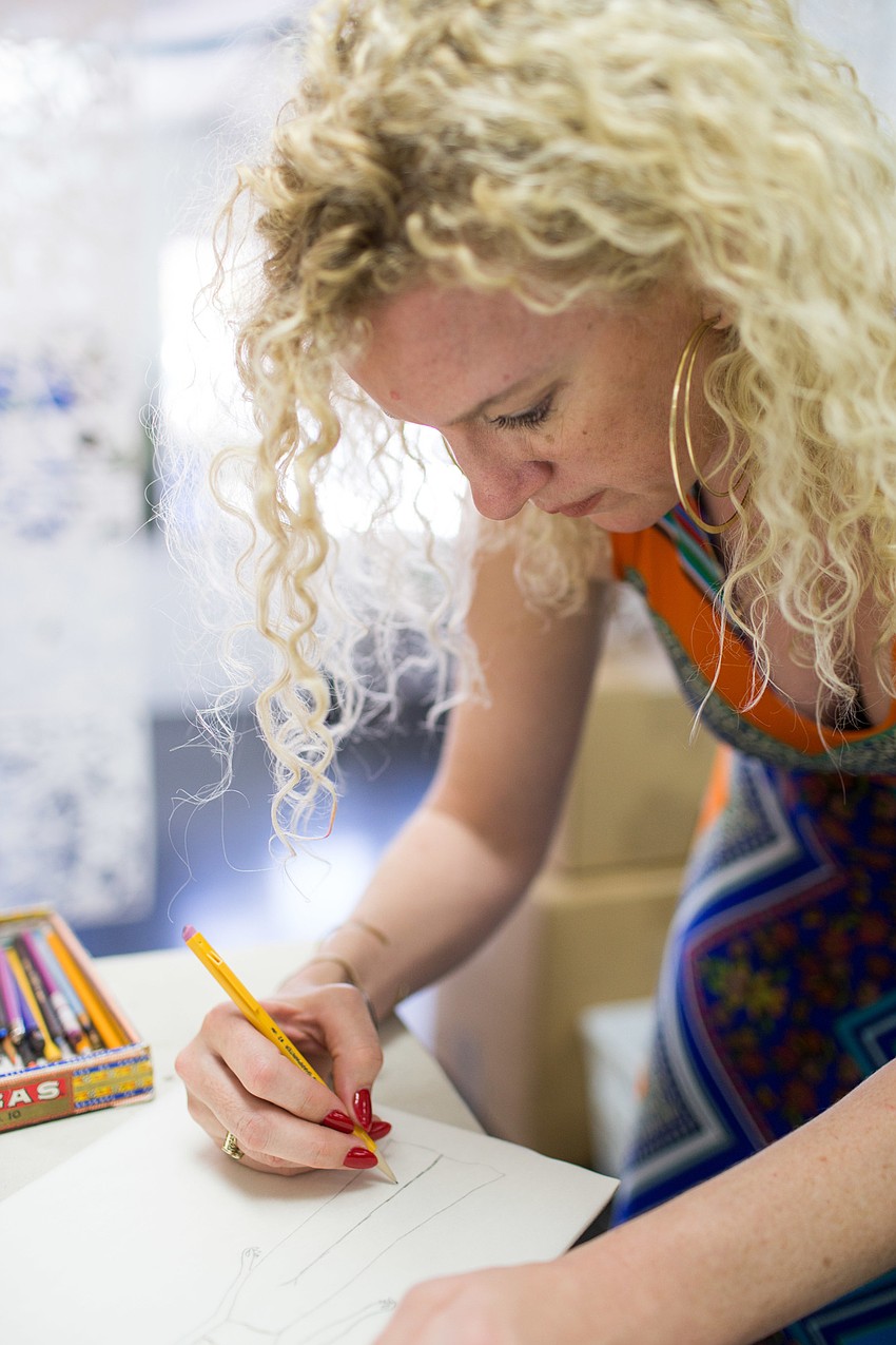 Huard's favorite design to create is jumpsuits. She carries a variety of jumpsuit designs in her shop.