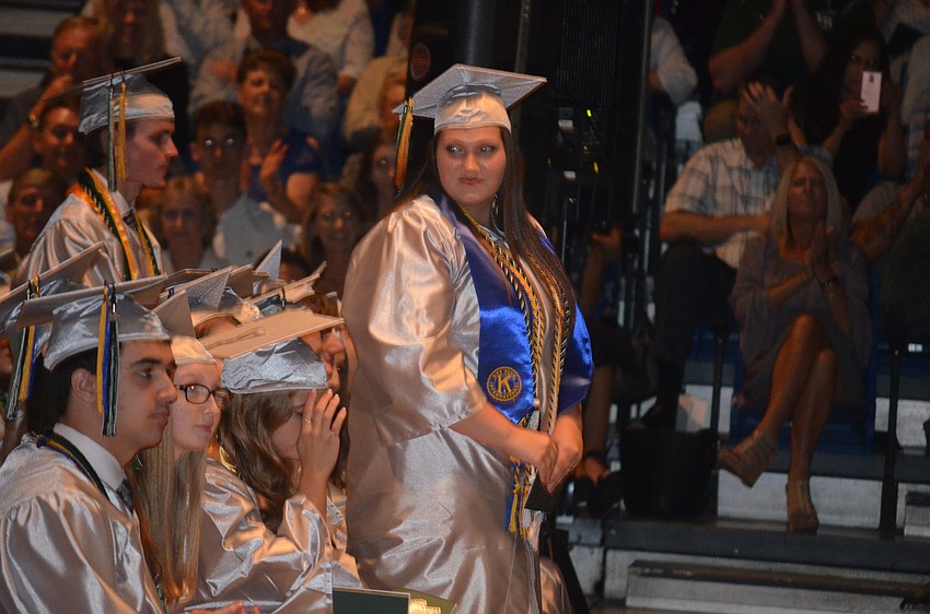 Kendra McCloud is honored during the ceremony for never skipping a single day of school in 13 years.