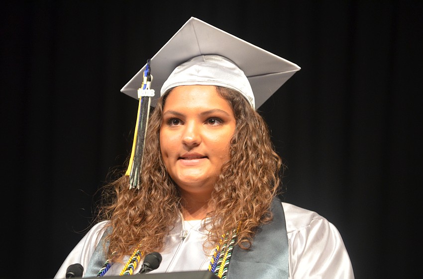 Senior class president Kailey Carpenter tells her fellow graduates the peak of their lives is far in the future.