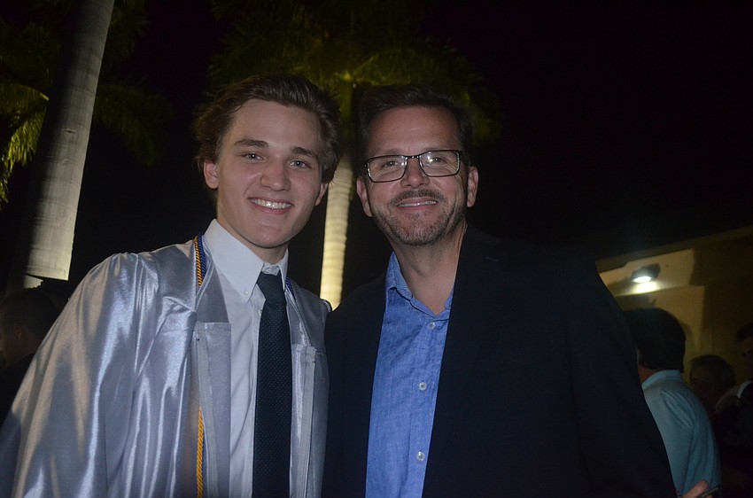 Max Gonzalez visits with his dad, Carlos Gonzalez, who says he watched his son's graduation with tremendous pride.