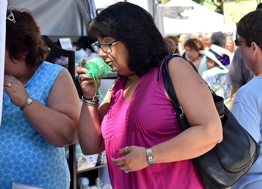 Angela Noble sniffs an artistic soap.