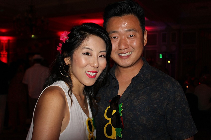 Sarasota's Clarice and Daniel Dokko, owners of the JPAN restaurant, enjoy the music.