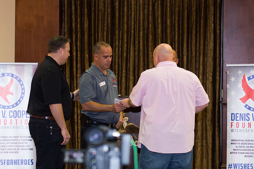 Gold Coast Eagle Distributing donated $500 in honor of founding board member Gary Kortzendorf's father.