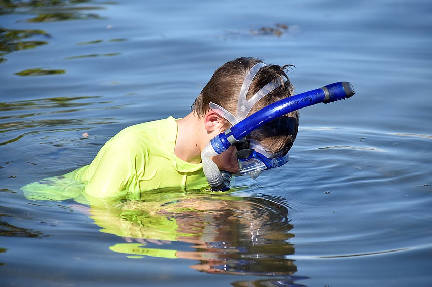 Ryan Ruthhaar explores the water near New Pass.
