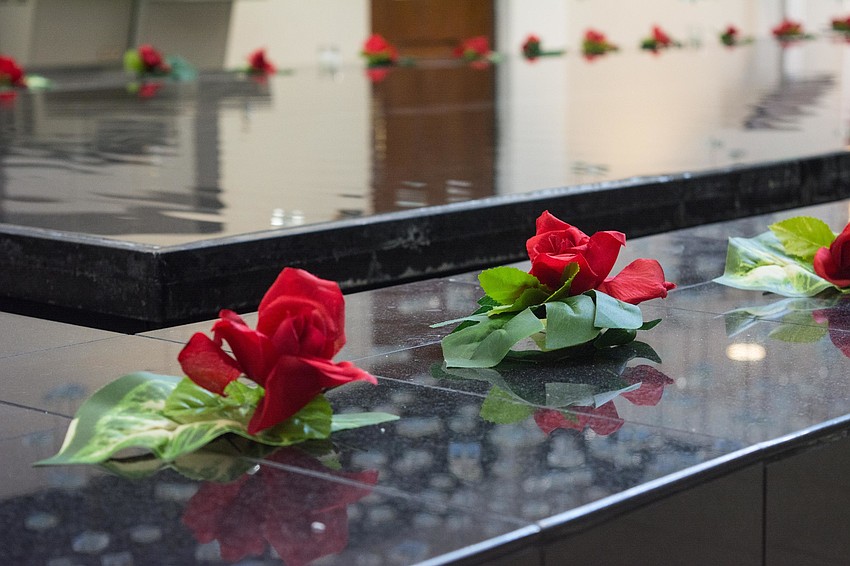 Roses representing the 49 victims of the Pulse attack lined the indoor fountain of Sarasota City Hall.