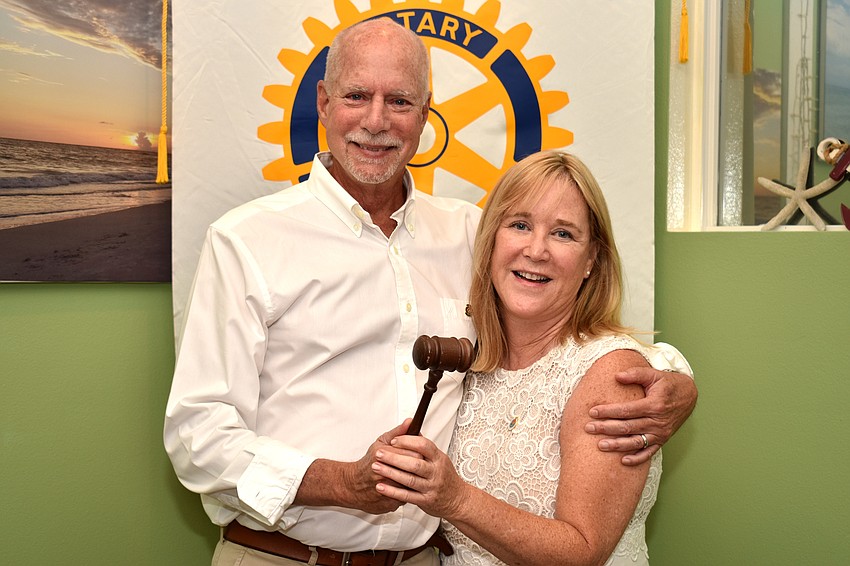 Outgoing President Jay Sparr and incoming President Susan McGuire