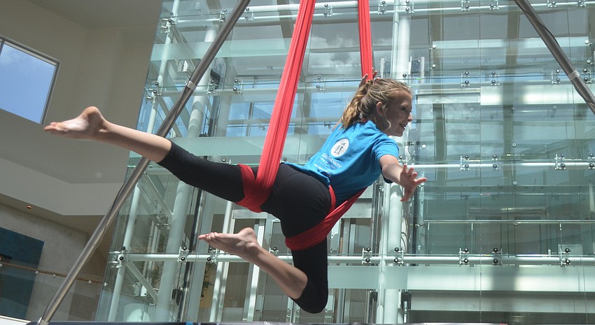 Kennedy Cameron, 15, performs with the Sailor Circus Academy in Sarasota.