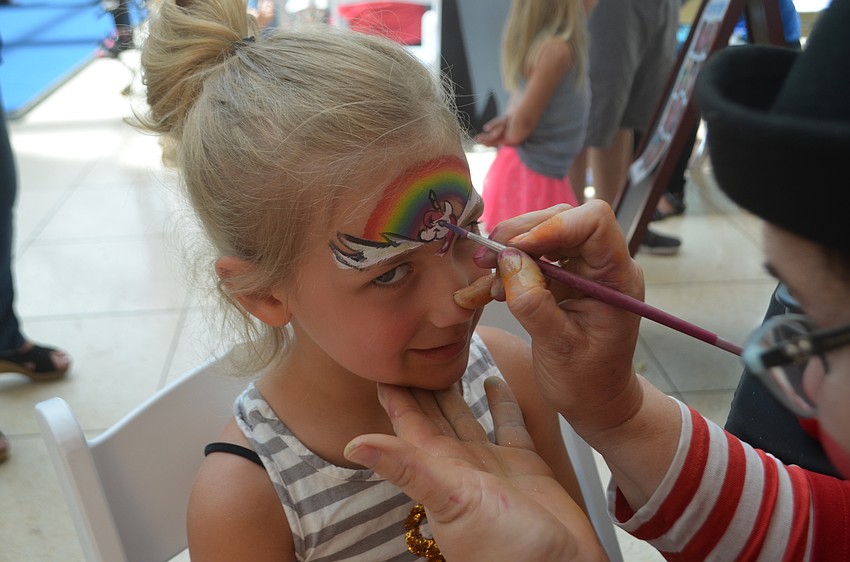 Eleanor Hon, 5, from Georgia, is visiting her family in Sarasota and loves unicorns.