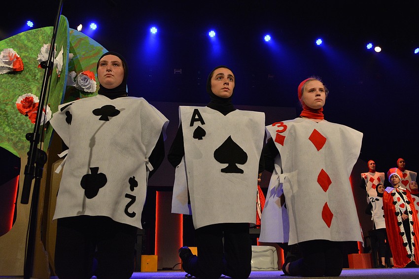 Royal cards Brianna Knighting, Jacob Figgins and Reagan Wilson get on their knees as the queen threatens 