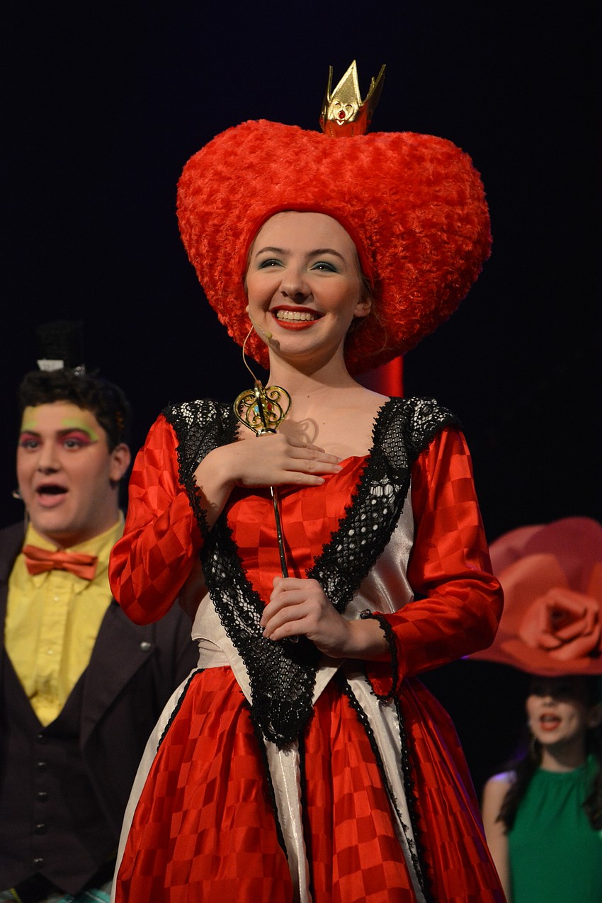 Queen of Hearts Anna Landis is pleased to have an unbirthday.