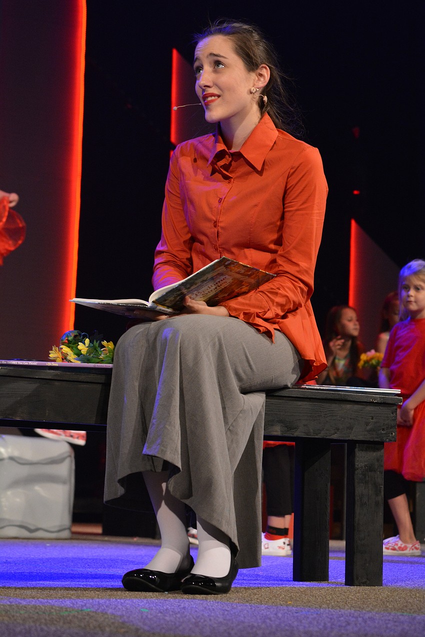 Alice's sister Mathilda, played by Ashley Light, wakes up Alice and tells her she was dreaming.