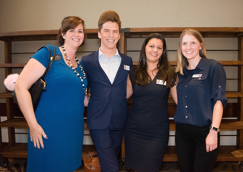 Monique Budelmen, Jacob Osborn, Sarah Firstemberger and Tabatha Davis represent the restaurant economy.