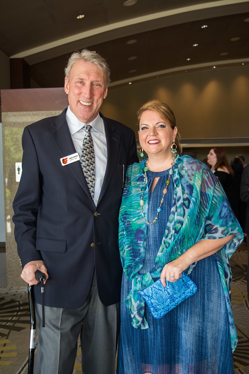 Vice President of Orioles-Sarasota David Rovine with Vice President of Goodwill Manasota Foundation Veronica Brandon Miller