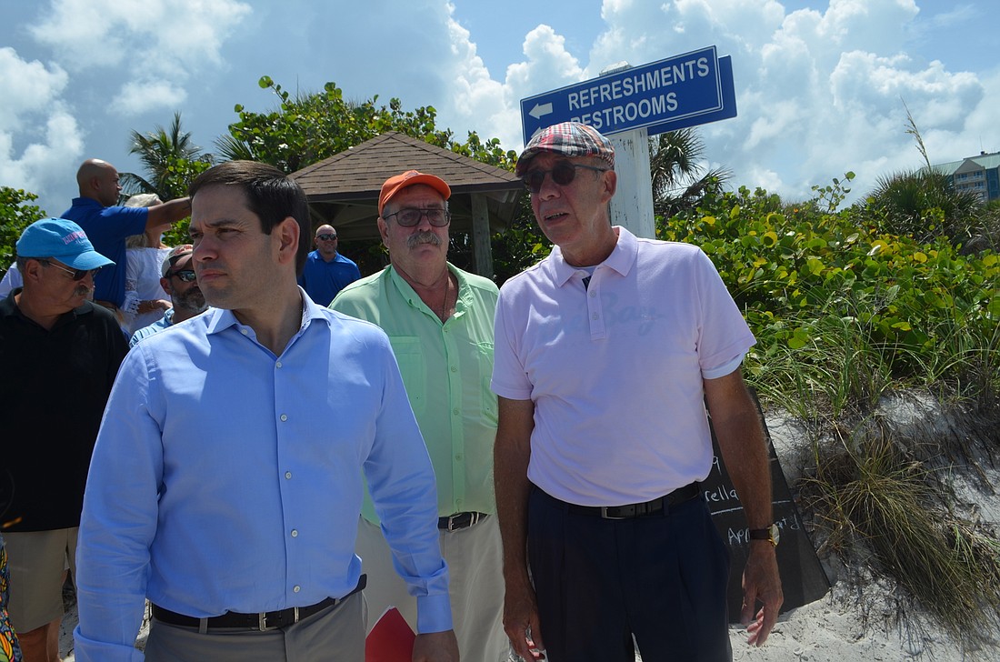 Sen. Marco Rubio and City Manager Tom Barwin, right, discuss the status of Lido Beach.