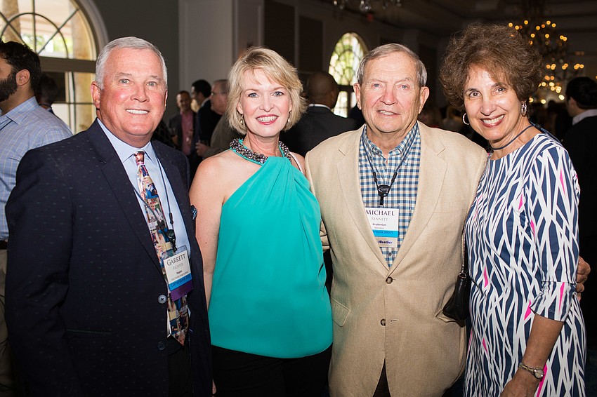 Sen. Garrett Richter, Veronica Brady, Sen. Mike Bennett and Dee Bennett