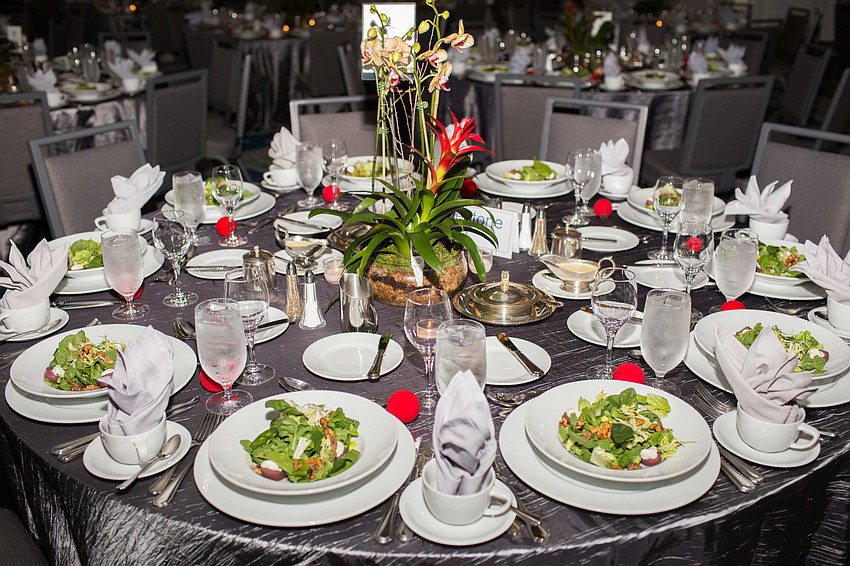 The tables were decorated with orchids.