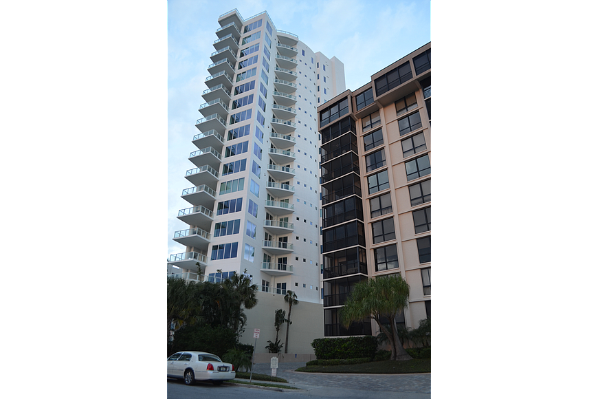 STOP claims that large projects such as the 624 Palm condo, left, were built without the city providing proper notice to residents living nearby.