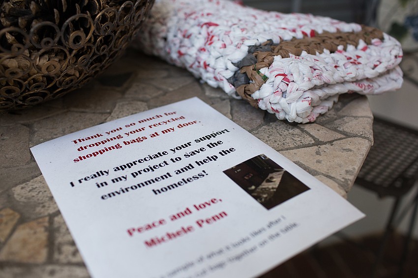 Michele leaves a note by her doorstep for neighbors to read when they drop off plastic bags.