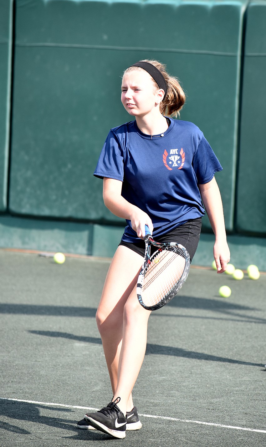 Ashley Vallrugo returns the ball during a camp match.
