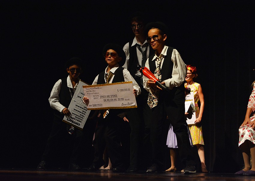 Isidro Iturralde and Alexander Alejo, along with Ethan Nealis and Spencer Waid, are talent agents who talk with sisters Spiker and Sponge about their giant peach.