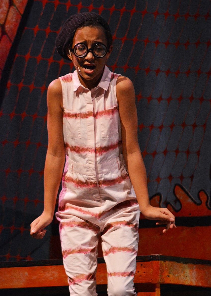 Earthworm, played by Yaira Spears, sings 
