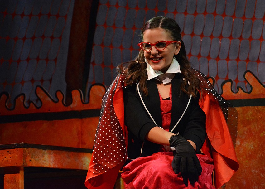 Isabela Mendez, portraying Ladybug, announces herself as royalty to James.