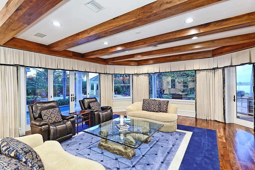 Floor to ceiling windows are among the homes' features.