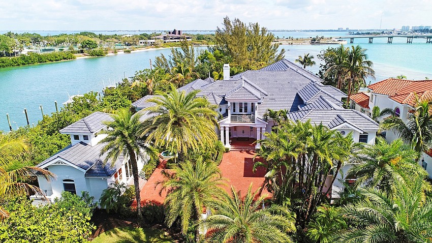 The 1.2 acre property is within walking distance of gulfside beaches.