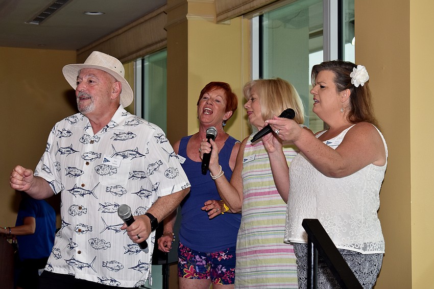 Phil Jalwan, Carol Patulo, Mary Jalwan and Karen O’Keefe sing “Love Shack.”