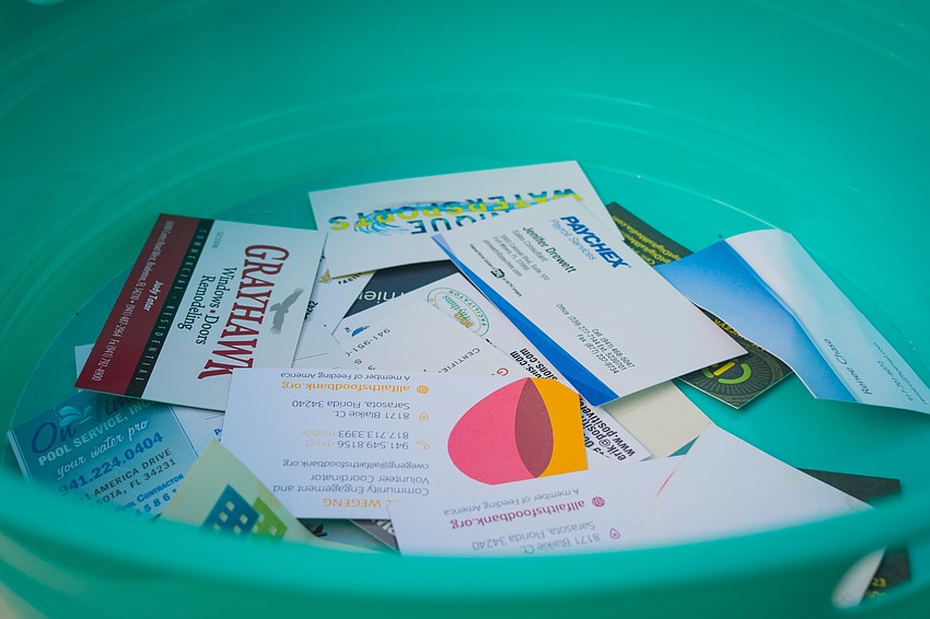 Dozens of members shared their business cards during the chamber's monthly event.