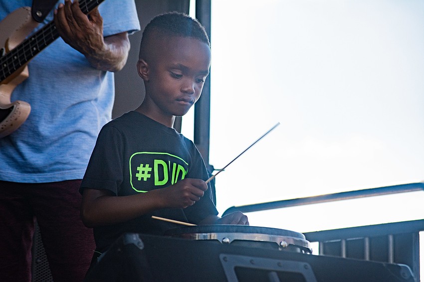 Five-year-old Ky-Mani Marley drums for Jah Movement.