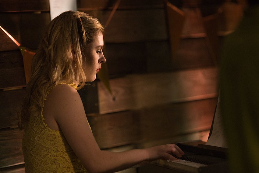 Taylor Reister  plays a tune on piano.