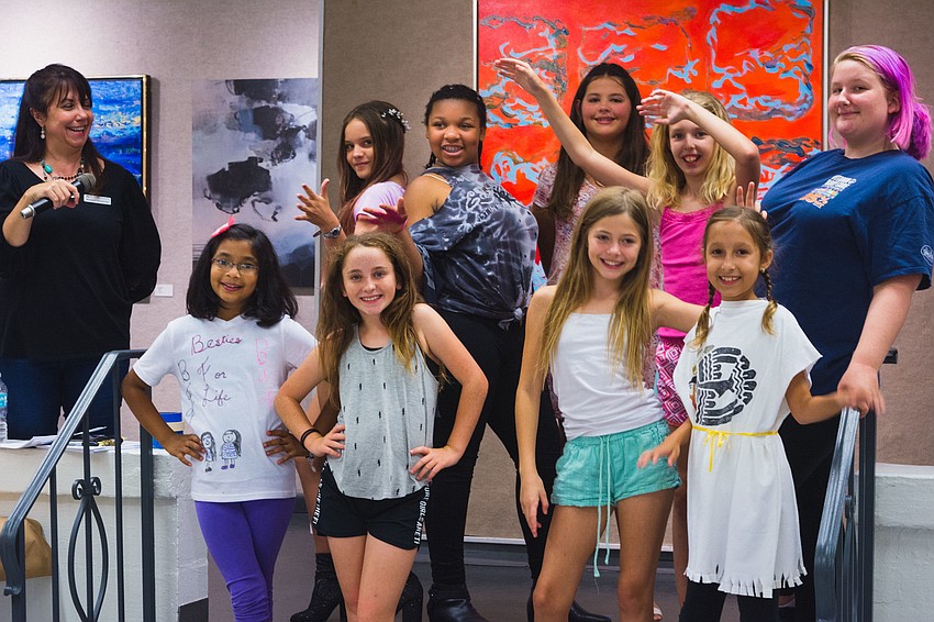 Campers practice for the runway show.