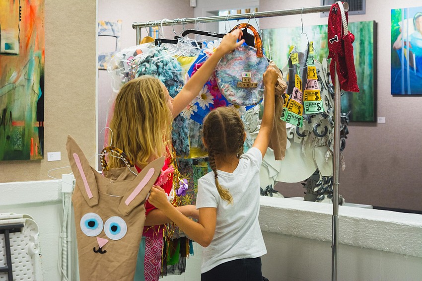 Norah Posey and Lea Versovsky get ready to change into their outfits.