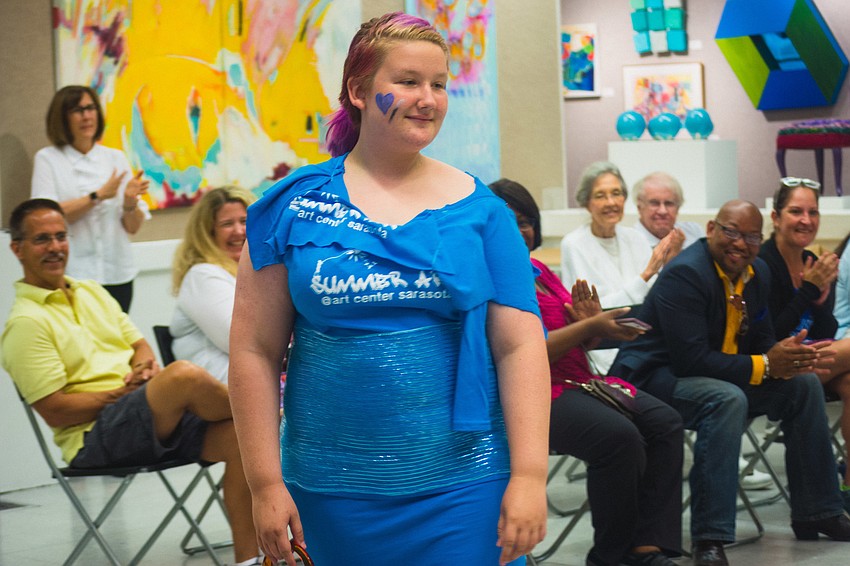 Chloe Berritt rocks an outfit made from recycled summer camp T-shirts.