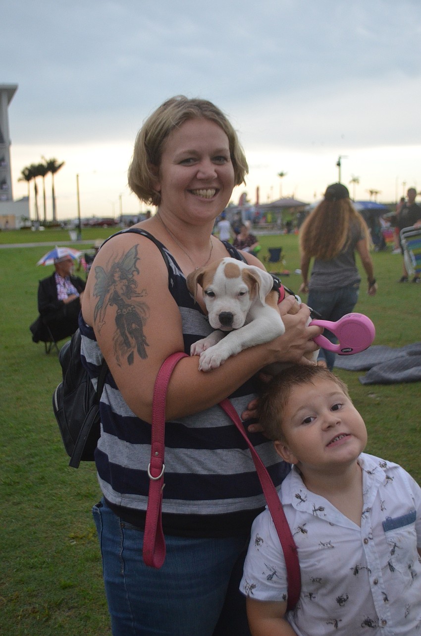 Sarasota's Megan Miller  and Liam Miller, 5, brought their new puppy, Tallulah, to watch the fireworks.
