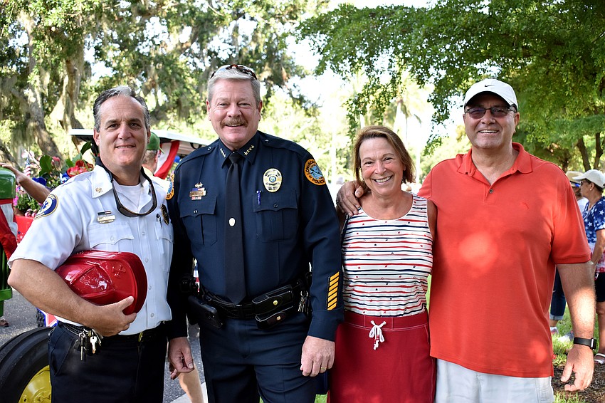 Fire Rescue Chief Paul Dezzi, Police Chief Pete Cumming, Dee Harmer and Town Manager Tom Harmer