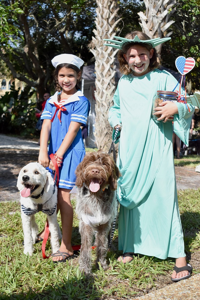 Lilly and Grace Gerling won “Most Patriotic” in the Hot Diggity Dog Contest with their dogs Sailor and Davy Jones.