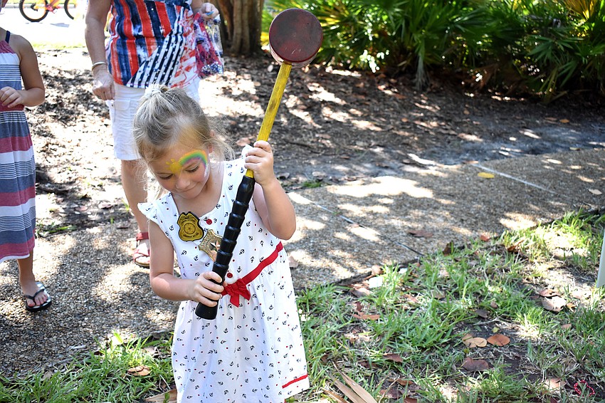 Susannah Holt tests out a game following the parade.