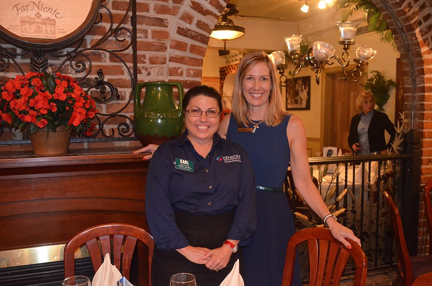 Debbie Shaffer, of Henson Mechanical, and Sherry Mills, of Michael Saunders & Co.