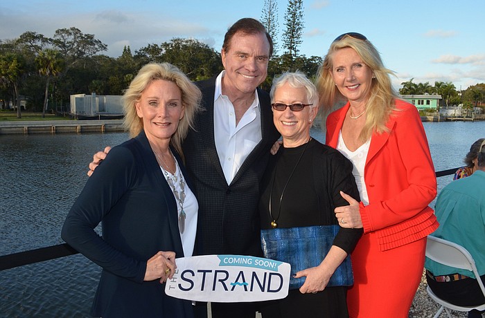 Developer Jim Bridges, second from left, formally announced The Strand at an event in January 2017. Now, he said the cityâ€™s intent to review proposed changes could be a setback for the project.