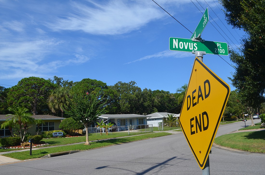 More than two dozen residents asked the city to officially adopt the name Novus Place â€” which is already on street signs in the area.