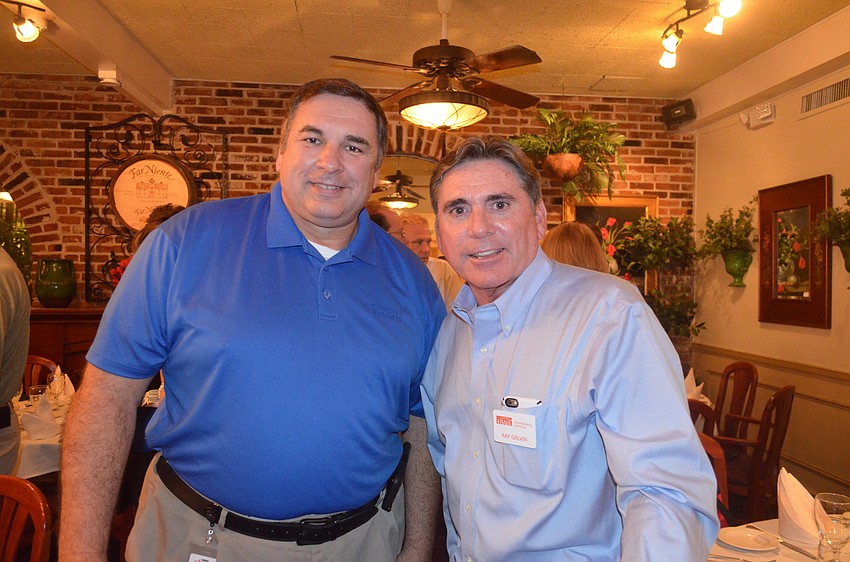 Adam Samblis, of Comcast Business, and Ray Galvin, of Home Warranty of America