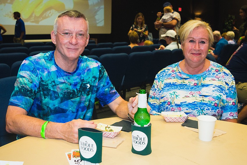Wayne and Margaret Goodman enjoy samples of lionfish dishes.