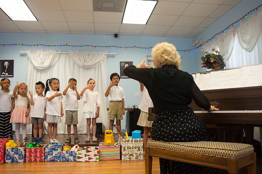 Campers use hand signals for singing different pitches with camp instructor Margaret Goreshnik.