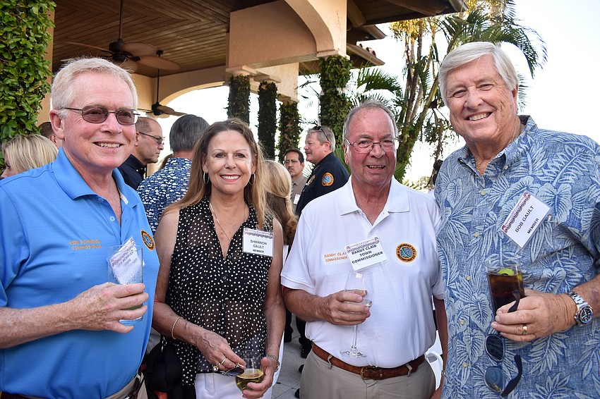 Commissioner Ken Schneier, Shannon Gault, commissioner Randy Clair and Bob Gault
