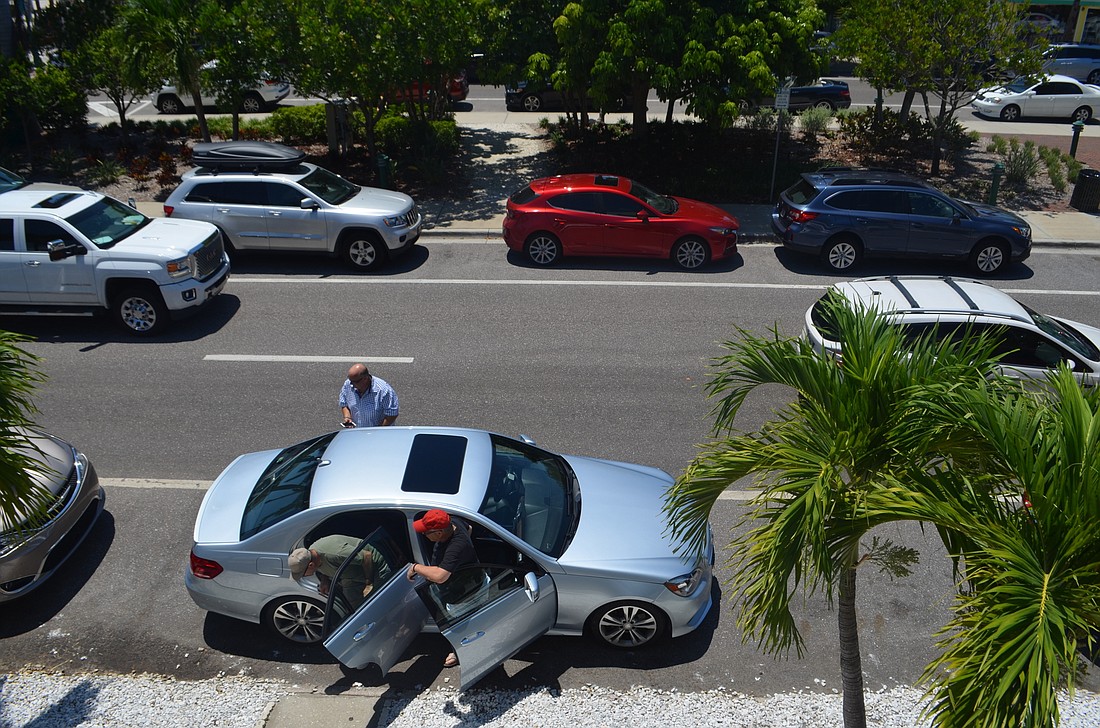 St. Armands Circle merchants have expressed concern that the implementation of paid parking, set to take place in December, will scare away potential visitors if other commercial areas like downtown have free on-street spaces.