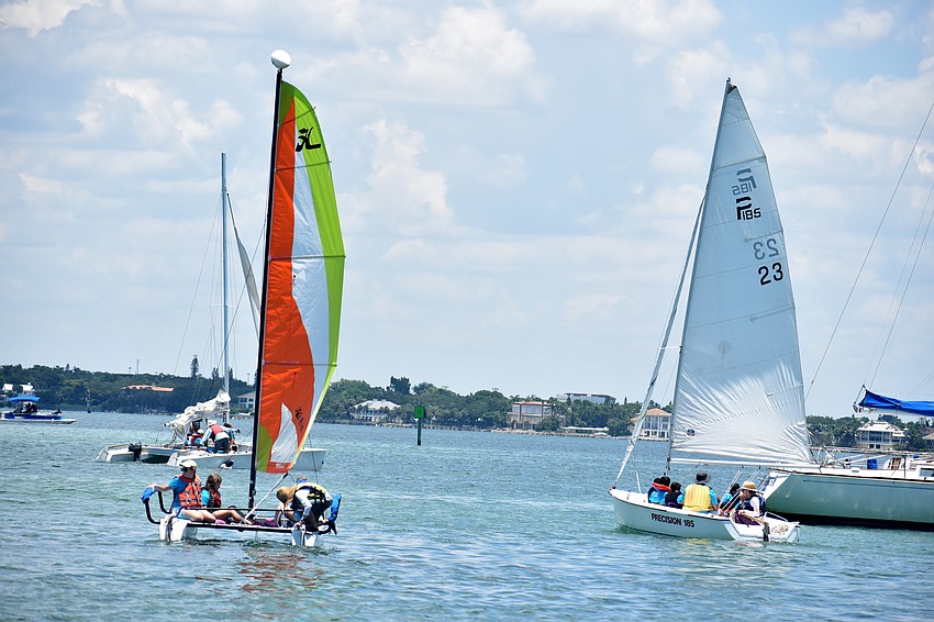 After learning the parts of a sailboat, Dream Center students, accompanied by Sarasota Youth Sailing coaches, sail around Sarasota Bay.