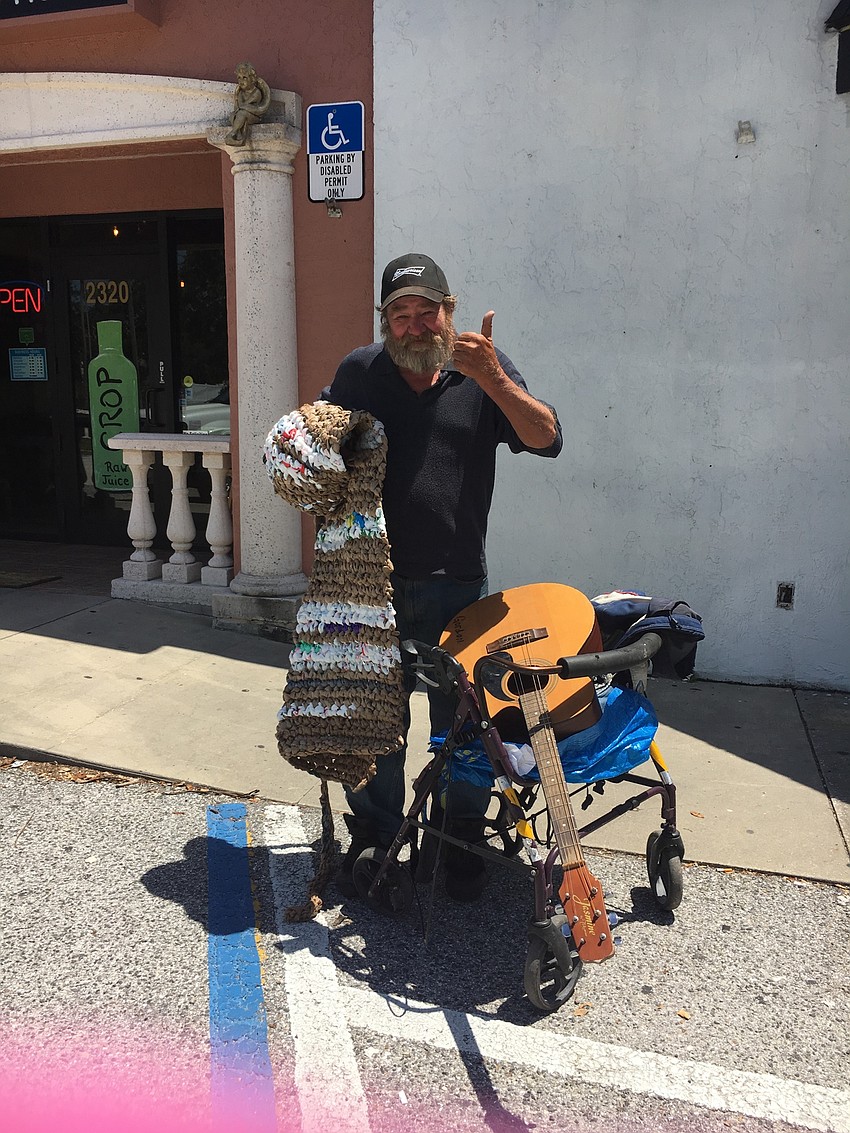 When Michele gives out a mat, she takes a photo of the receiver with his or her new mat. Courtesy Photo.